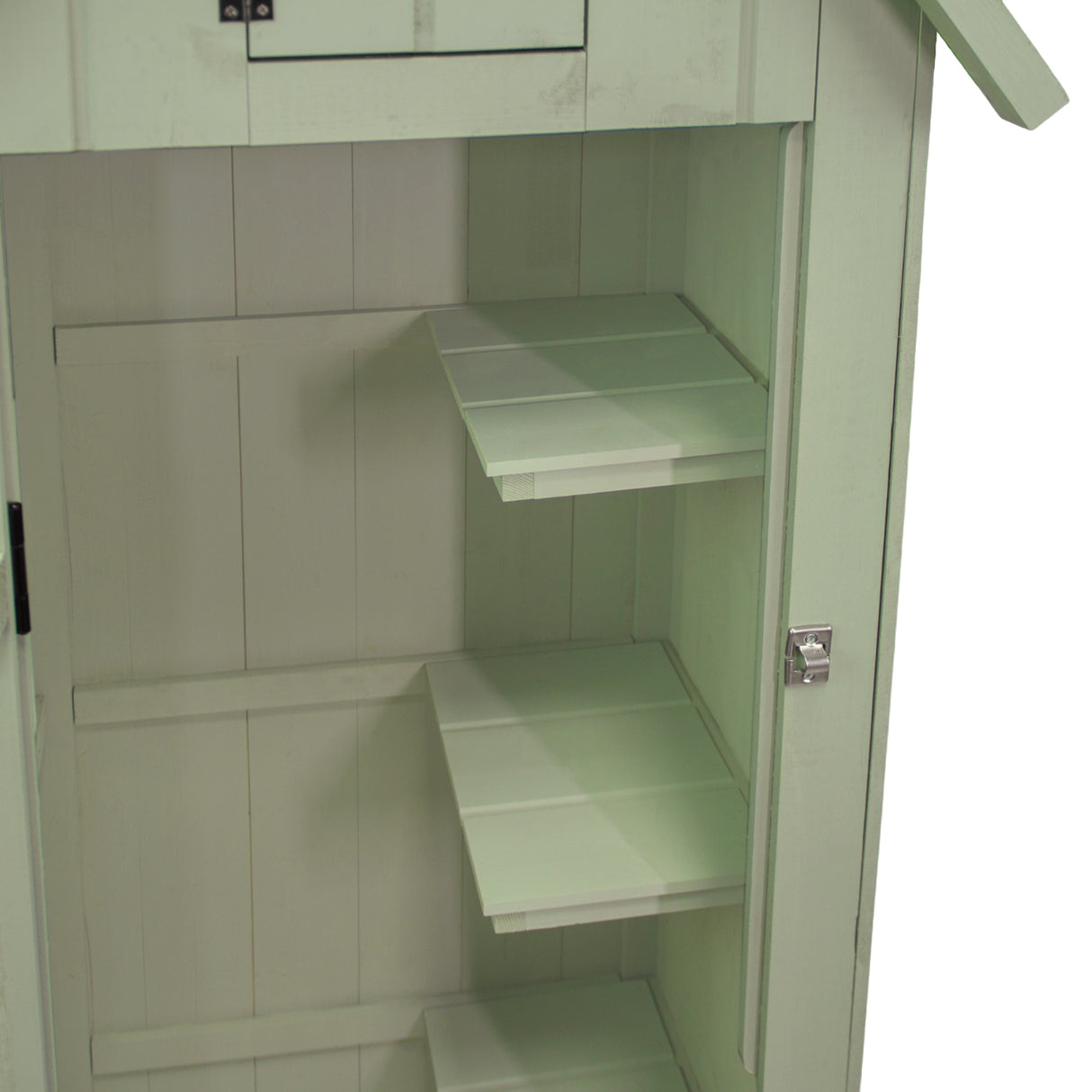 Casetta da giardino in legno verde chiaro con ripiani interni bianchi, design semplice e funzionale, ideale per riporre attrezzi