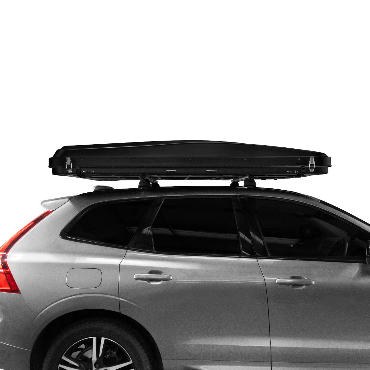 Tenda da tetto marrone su un'auto grigia, con un design aerodinamico e superficie liscia, ideale per viaggi all'aperto