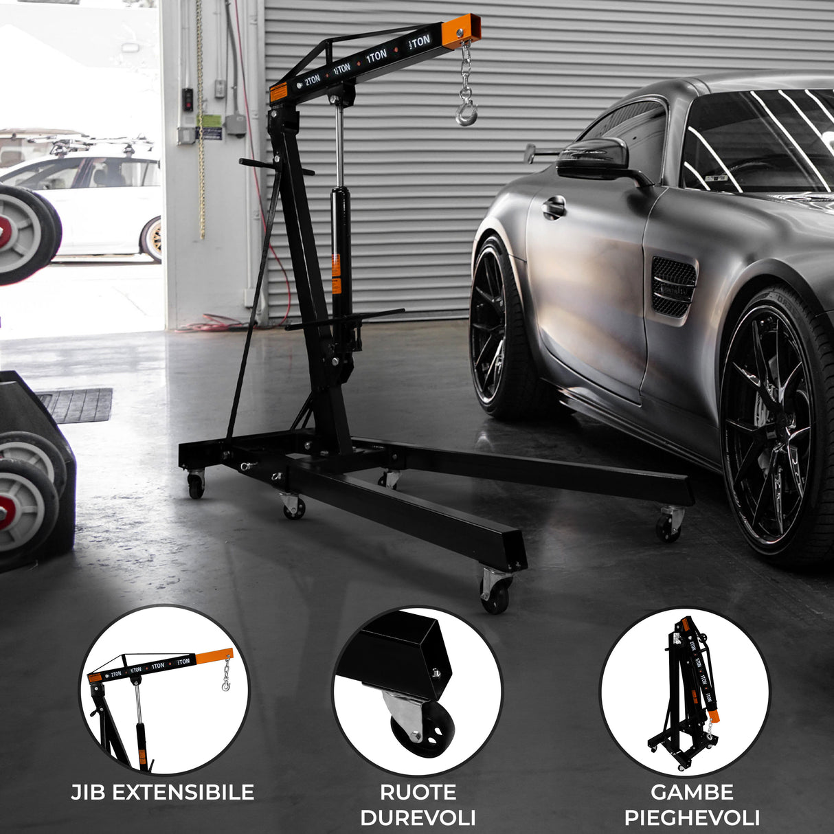 Gru idraulica nera per motori da 2 tonnellate, con jib estensibile, ruote durevoli e gambe pieghevoli, ideale per officine automobilistiche