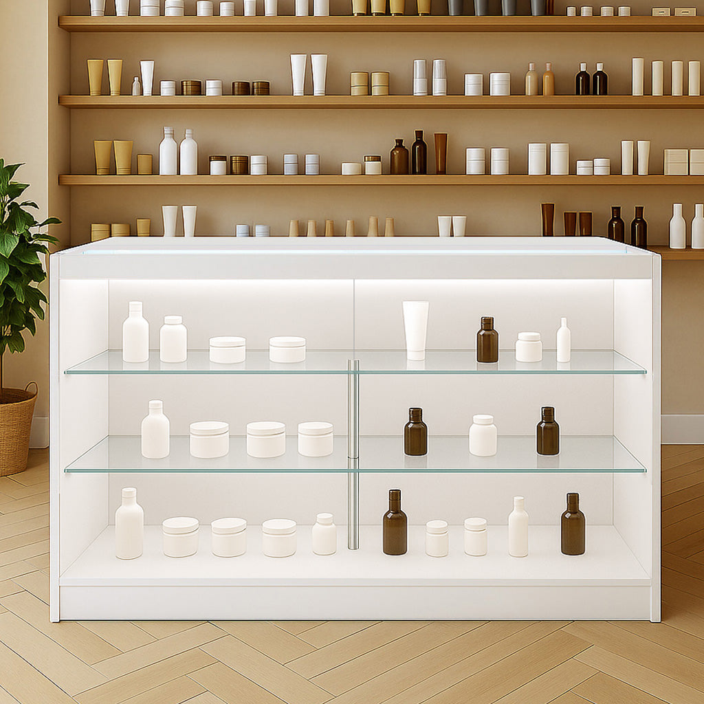 Bancone da negozio LED K1500 bianco con ripiani in vetro, espositore per prodotti cosmetici in bottiglie di varie forme e colori