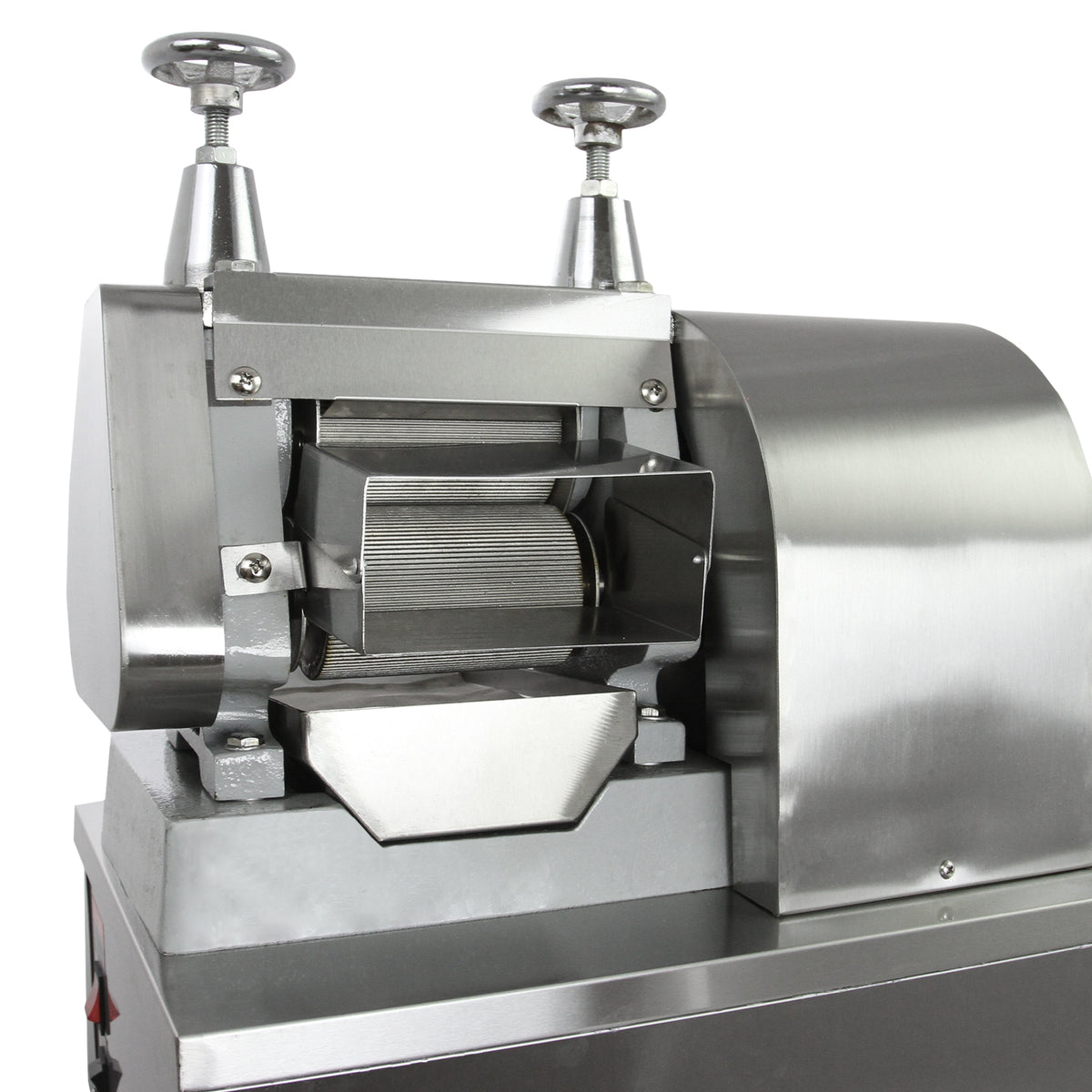 Macchina per la lavorazione degli alimenti in acciaio inox, con finitura lucida, manopole di regolazione e struttura robusta e compatta