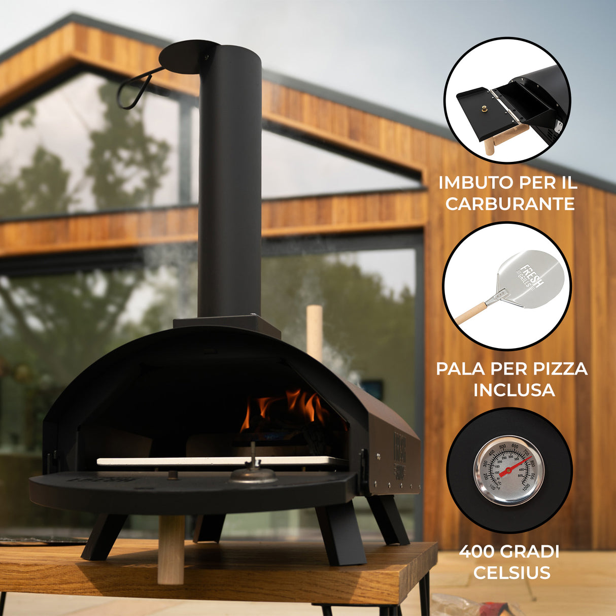 Forno per pizza da esterno con finitura nera, camino alto, pala inclusa e termometro che segna 400 gradi Celsius, design elegante e funzionale
