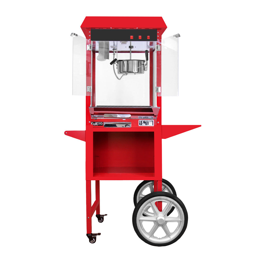 Carrello per popcorn KuKoo di colore rosso brillante, con struttura metallica, ruote robuste e sportello trasparente per visibilità