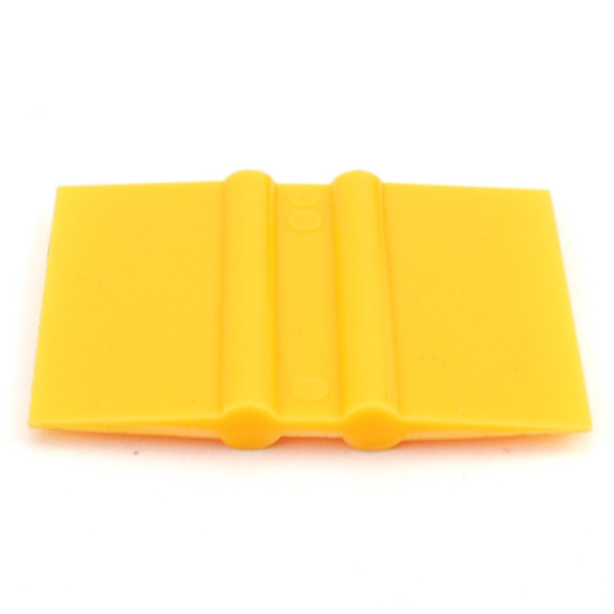 Taglierina per vinile gialla, con superficie liscia e bordi arrotondati, ideale per un taglio preciso su materiali vari