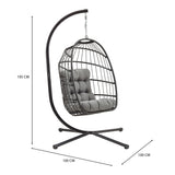 Poltrona sospesa a uovo in rattan nero con struttura metallica, cuscini grigi, design moderno e accogliente per interni ed esterni