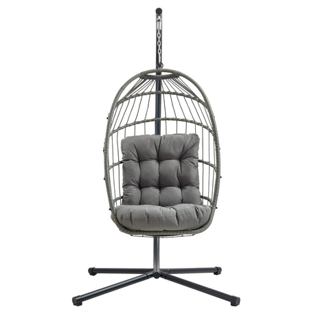 Poltrona sospesa a uovo in rattan grigio con cuscino imbottito, struttura nera, design moderno e accogliente per interni ed esterni