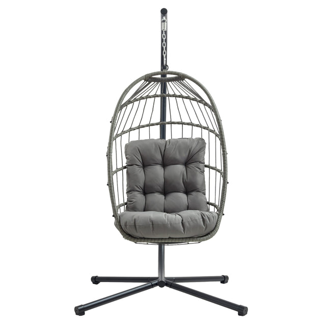 Poltrona sospesa a uovo in rattan grigio con cuscino imbottito, struttura nera, design moderno e accogliente per interni ed esterni
