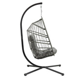 Poltrona sospesa a uovo in rattan grigio con struttura nera, cuscino morbido e design elegante per interni ed esterni