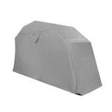 Tenda per moto grigia, con forma aerodinamica e superficie liscia, progettata per proteggere le moto dalle intemperie