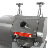 Macchina per alimenti in acciaio inox con manopole cromate, fessura di alimentazione e avvisi di sicurezza evidenti in rosso