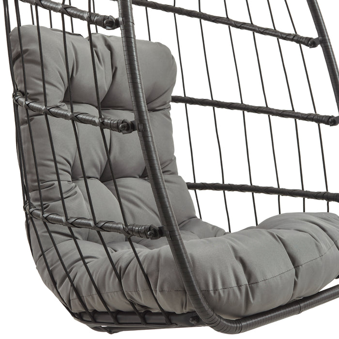 Sedia a dondolo sospesa con struttura in metallo nero e cuscino grigio imbottito, ideale per interni ed esterni moderni