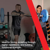 Bilanciere olimpico Body Revolution 182 cm con dischi azzurri, utilizzato per allenamenti di tonificazione e forza in palestra