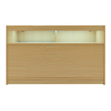 Bancone negozio in legno d'acero chiaro con illuminazione LED, design moderno e superficie liscia, ideale per esposizione prodotti