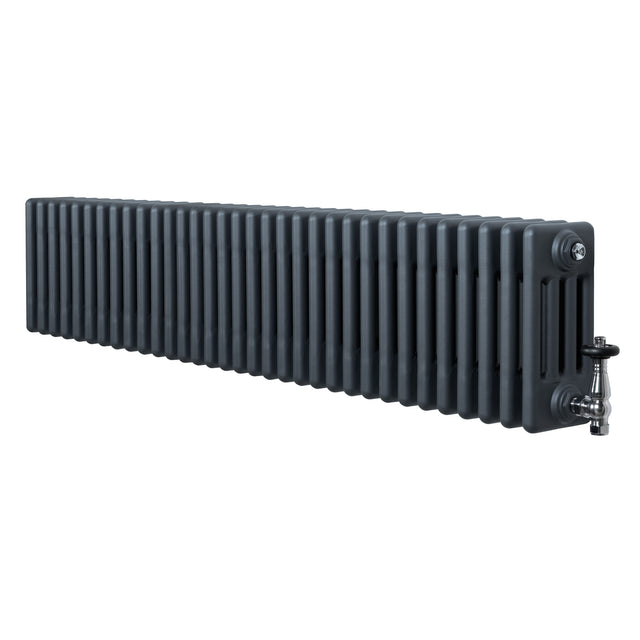 Radiatore tradizionale a 4 colonne in grigio antracite, lungo e rettangolare, con finitura liscia e valvole metalliche lucide