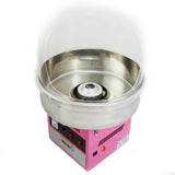 Macchina per zucchero filato di colore rosa con struttura in acciaio inox, dotata di coperchio trasparente e pulsanti di accensione