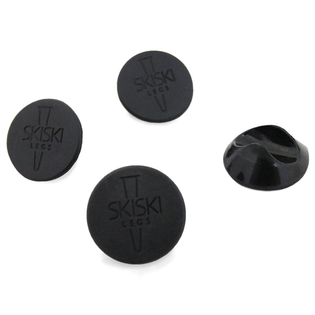 Piedini protettivi neri in silicone per gambe hairpin da 10 mm, rotondi e antiscivolo, con logo SKISKI inciso sulla superficie