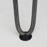 Piedini protettivi neri per gambe hairpin da 12 mm, in plastica resistente, con forma conica e superficie liscia per stabilità